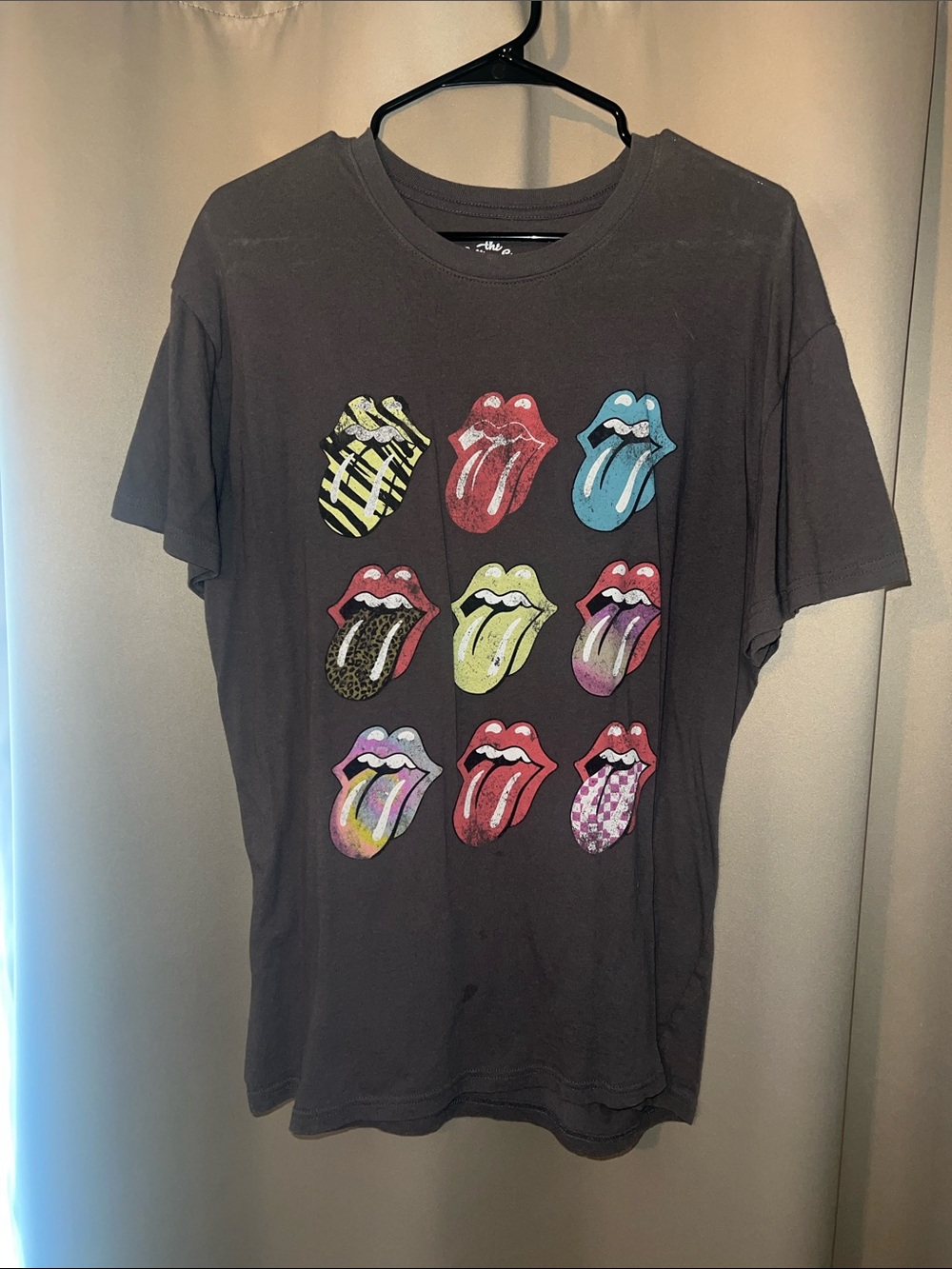 the Rolling Stones Black Short Sleeve Tee with Multicolor Tongue Graphics